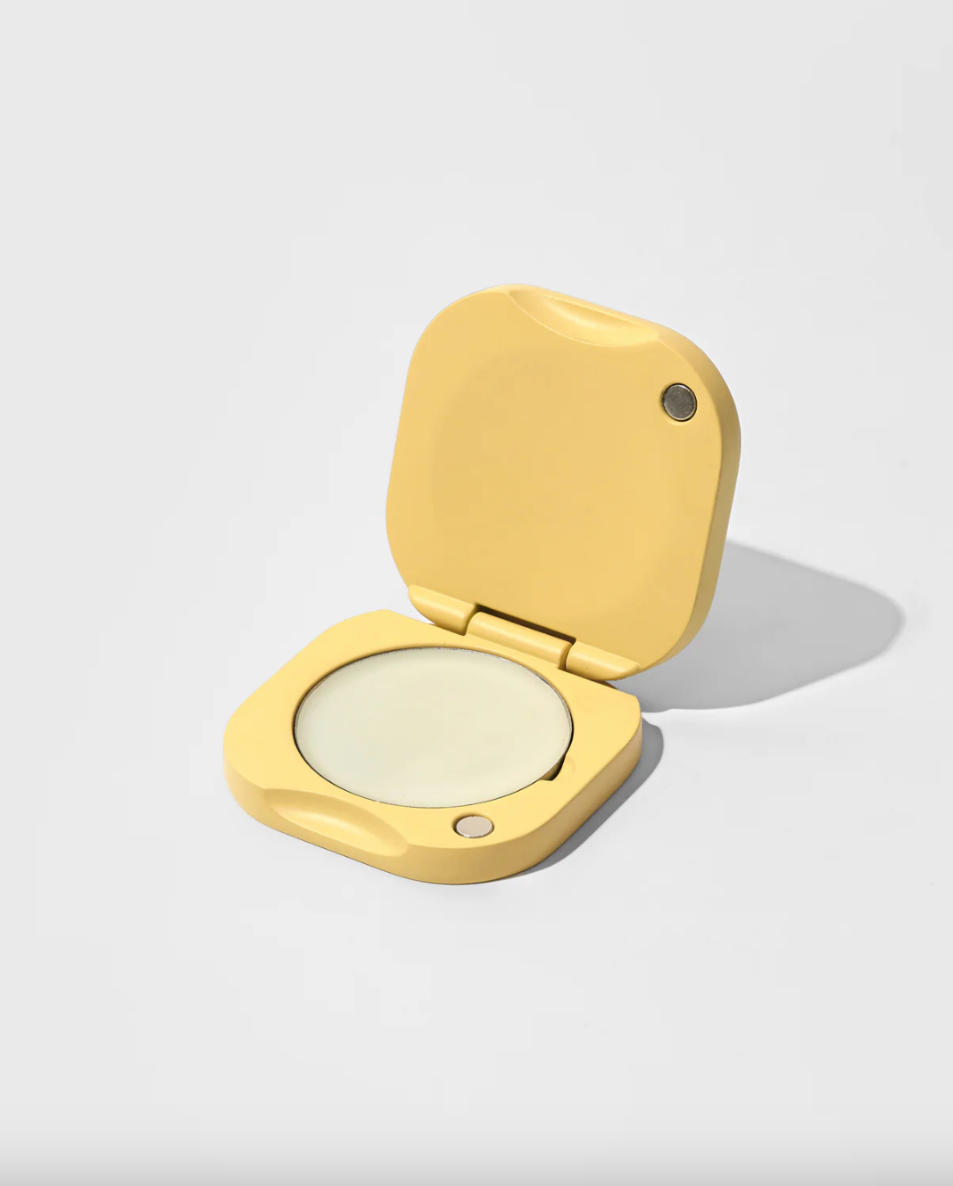 Butter Refillable Vessel open with solid perfume balm inside