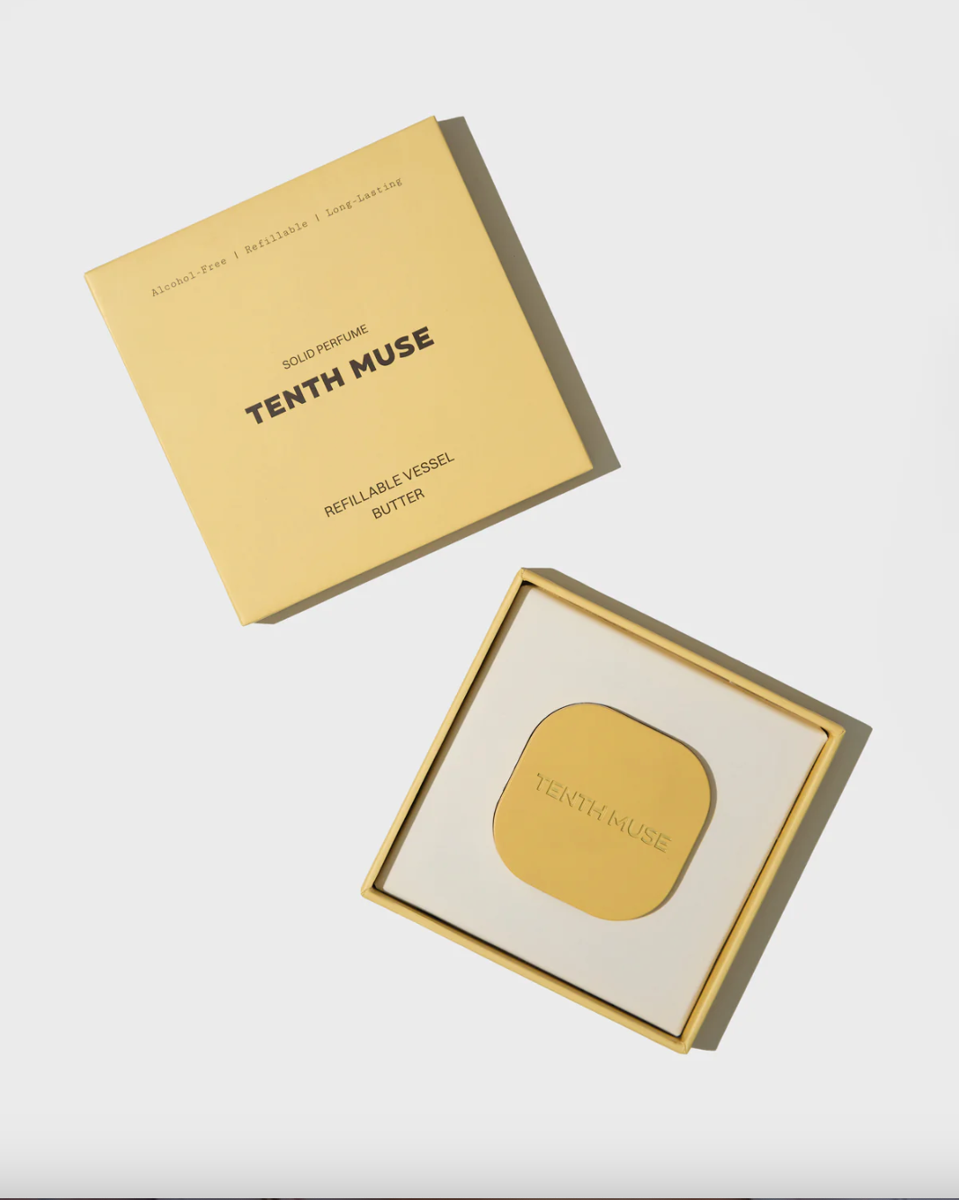 Butter vessel in packaging showing logo and product details in coordinating yellow branding