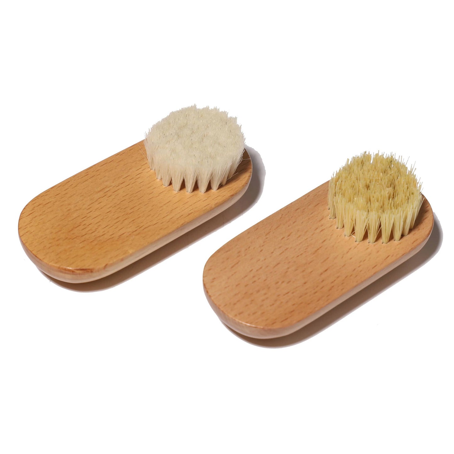 two sisal bristle dry face brush angled to show brush texture