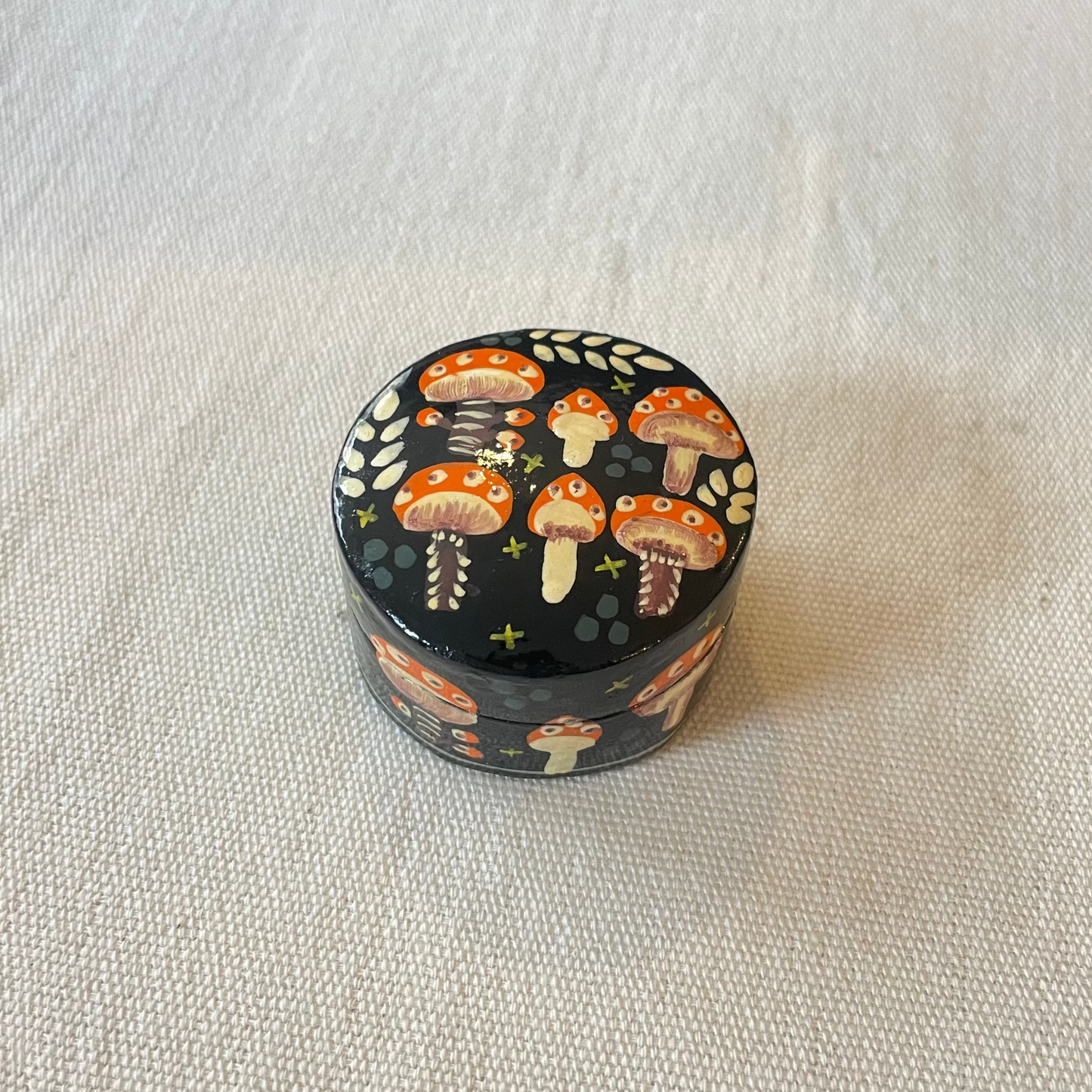 Tiny decorative keepsake box with woodland scene on neutral linen