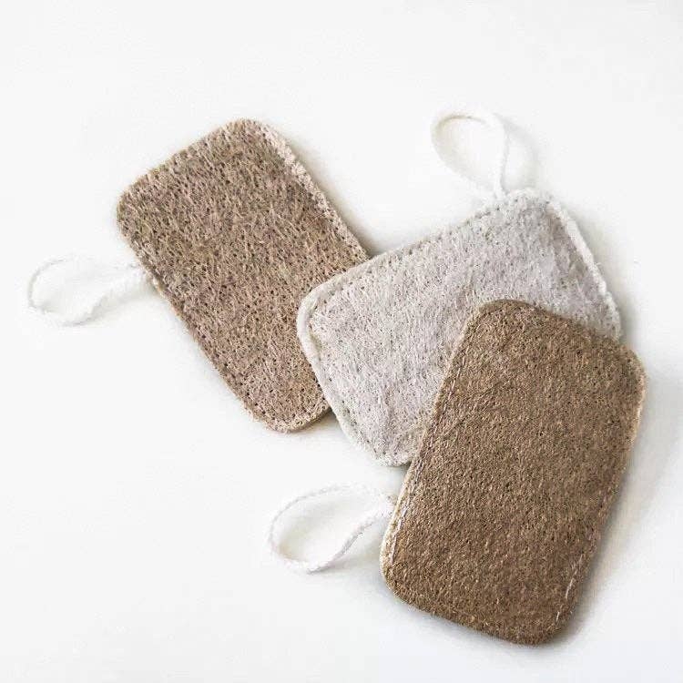 Top-down view of loofah sponge bundle showing raw, natural finish