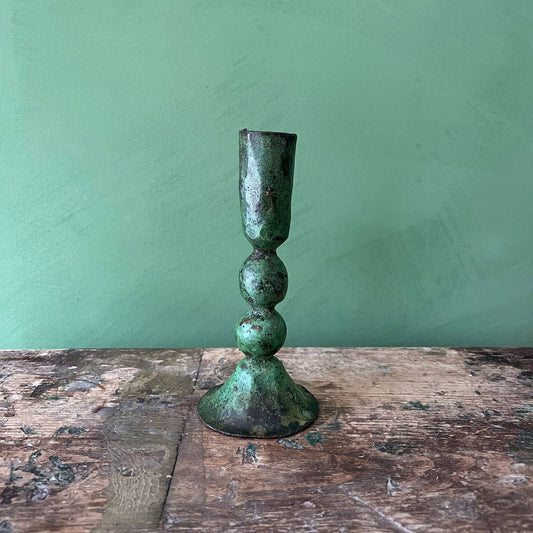 tall green candleholder