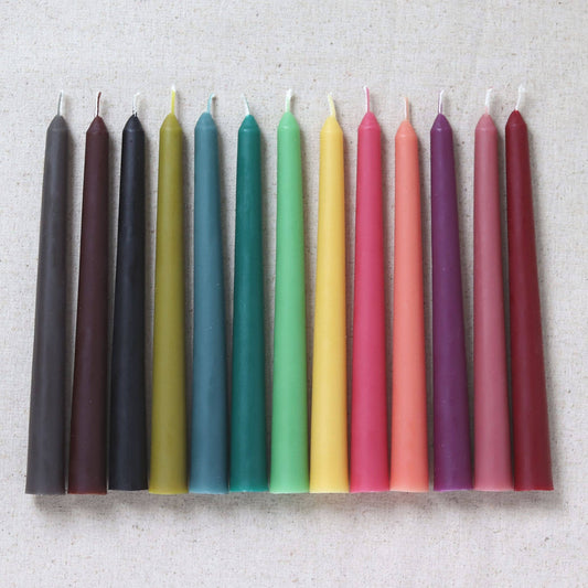 red, brown, green, pink and wine colour beeswax taper candles