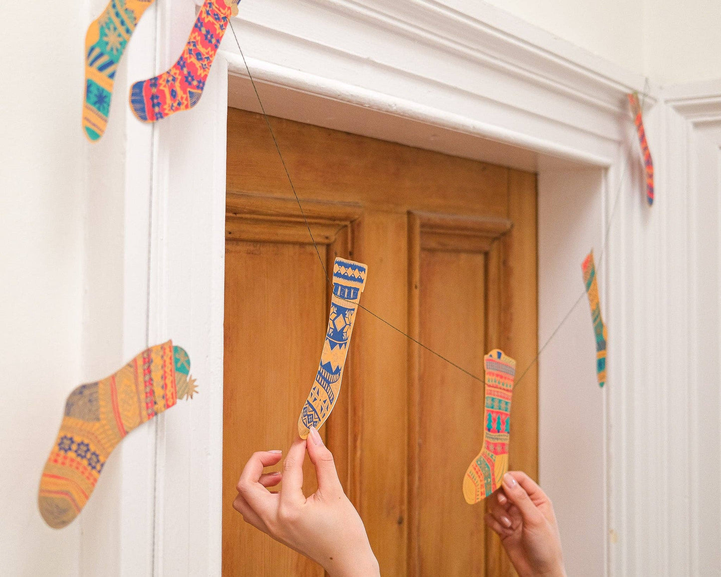 Festive Stockings Christmas Garland by East End Press